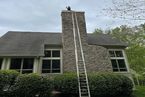 chimney sweep at work